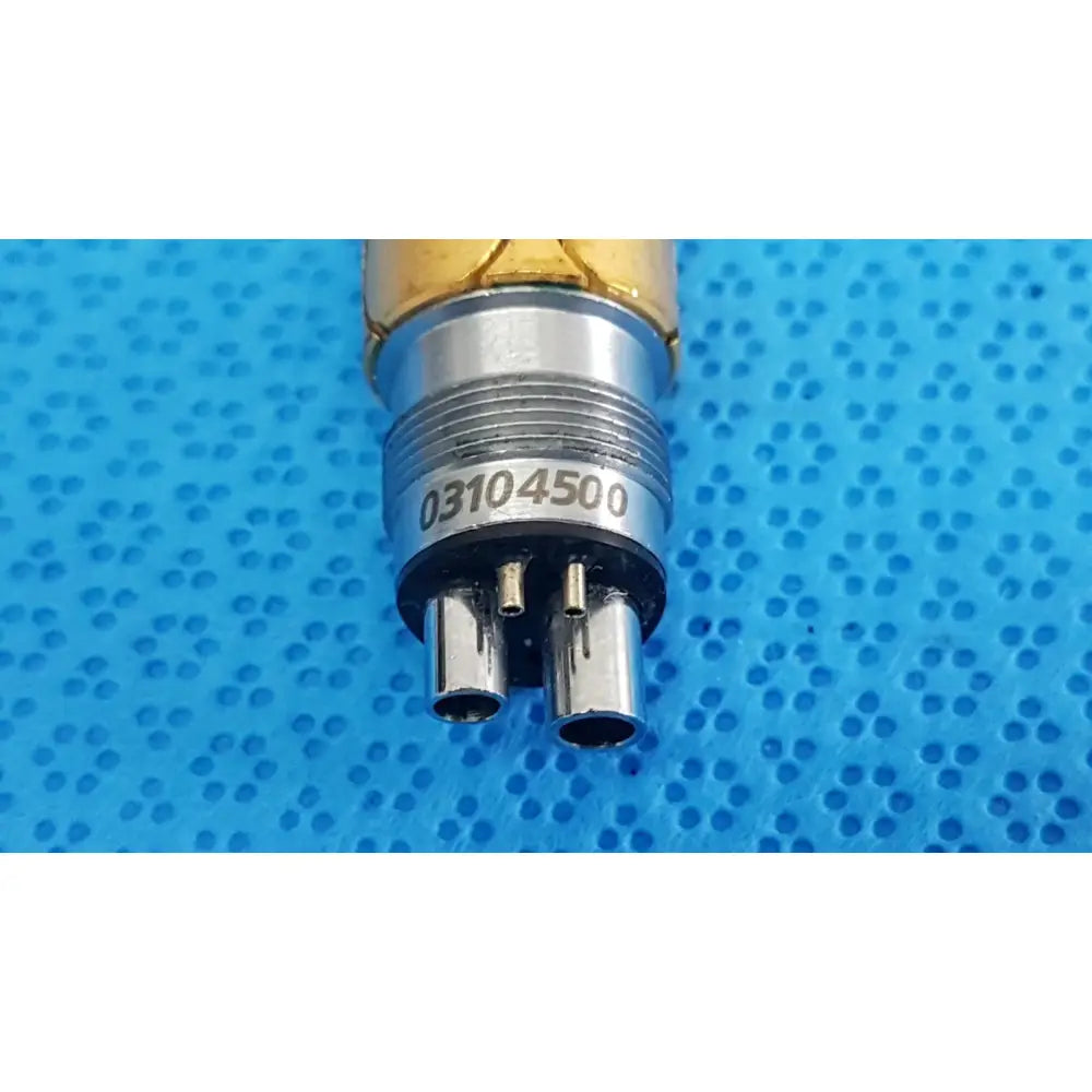 Silver-colored metallic adapter for w&h lw-style air high-speed handpieces with gold tip and serial number 03104500