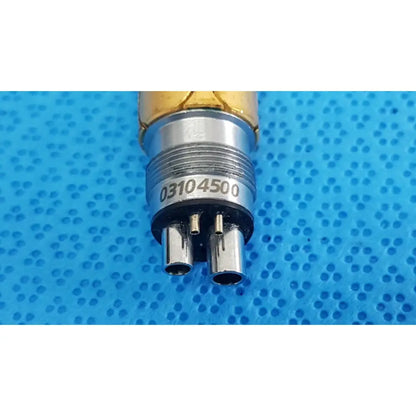 Silver-colored metallic adapter for w&h lw-style air high-speed handpieces with gold tip and serial number 03104500