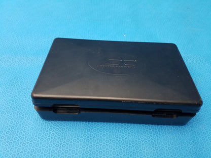 Black nintendo ds handheld console with matte plastic finish and embossed ds logo shown with adc diagnostix pocket diagnostic set case