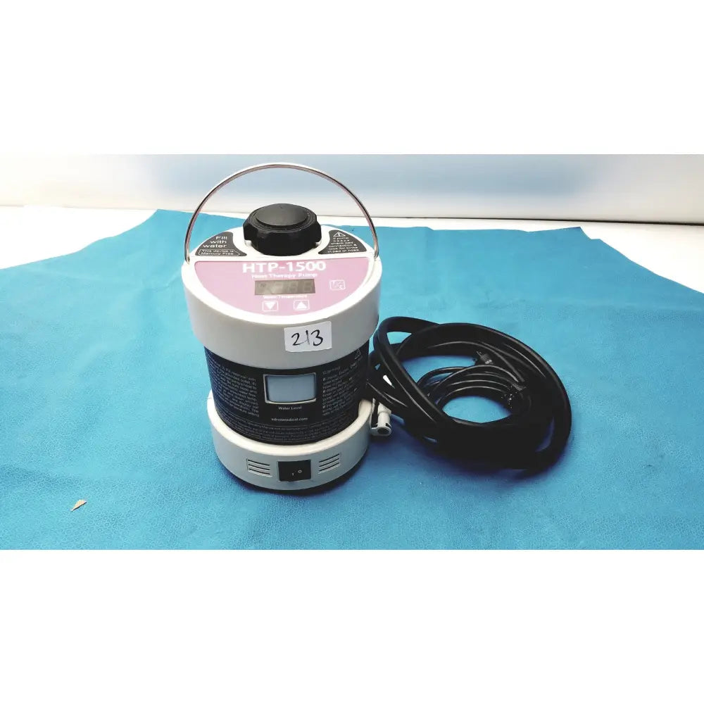 Adroit htp-1500 heat therapy pump white and pink cylindrical device with black handle digital display and coiled cord