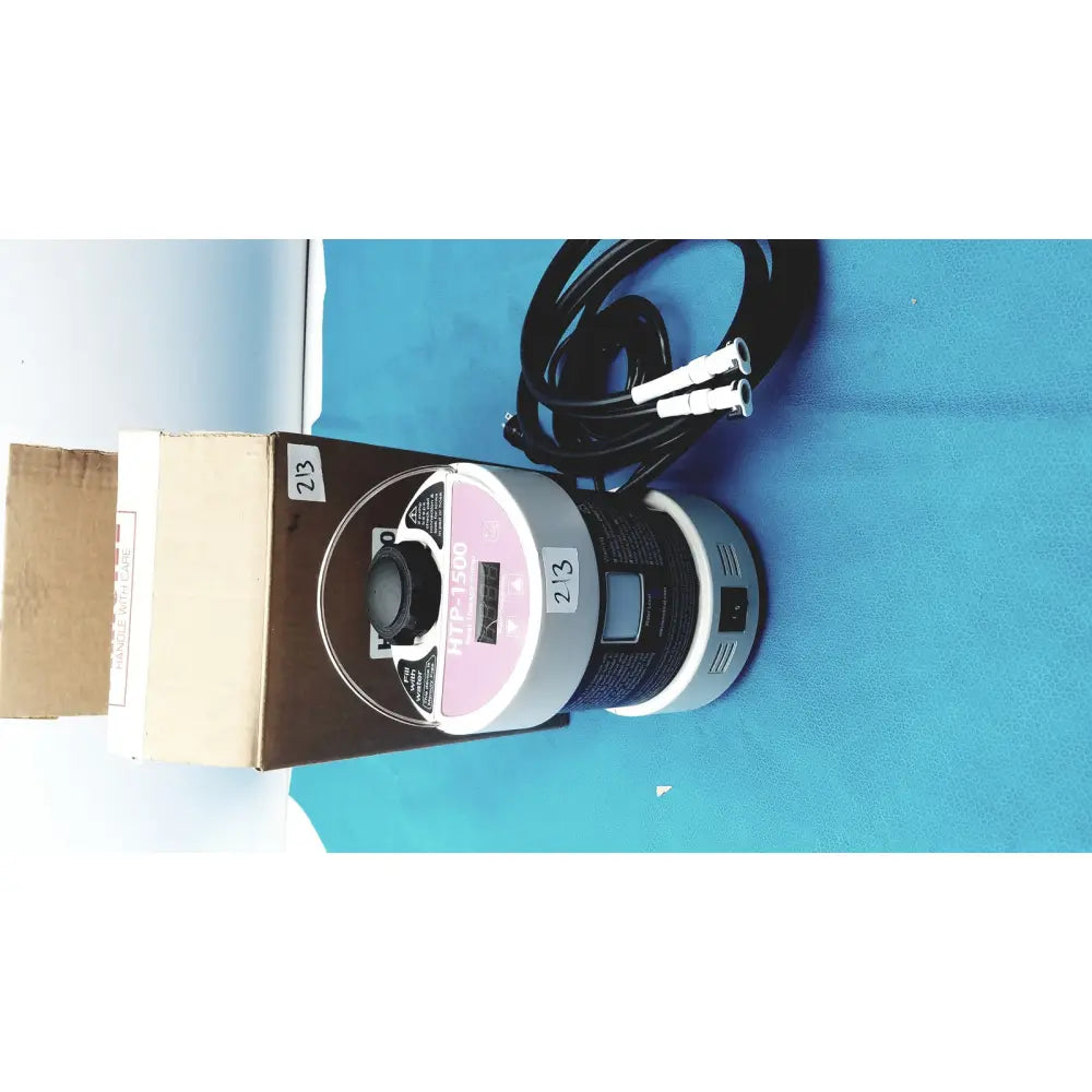 Silver and black cylindrical heat therapy pump with digital display labeled pac-1500 for heat therapy use