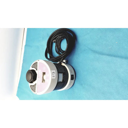 Gray and black cylindrical heat therapy pump htl-1540 with coiled power cord for heat therapy use