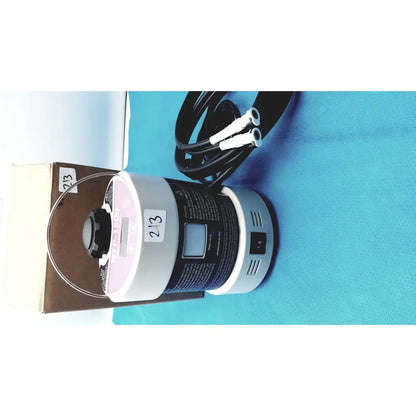 Gray and black cylindrical adroit htp-1500 heat therapy pump with digital display control buttons and coiled power cord