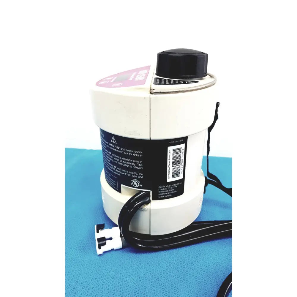 White plastic heat therapy pump with black cap and tubing for adroit htp-1500 portable hot cold therapy unit