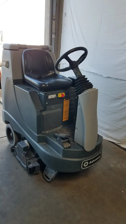 Gray and black advance es4000 ride on carpet cleaner extractor with steering wheel for wet dry vacuum cleaning