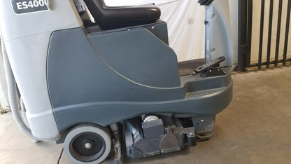 Gray and black advance es4000 ride on carpet cleaner extractor with es400 model label for wet dry cleaning use