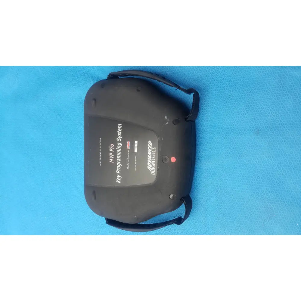 Black plastic advanced diagnostiics mvp pro key programming system with carrying strap and red power indicator light