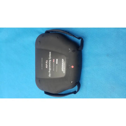 Black plastic advanced diagnostiics mvp pro key programming system with carrying strap and red power indicator light