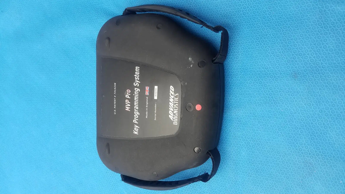 Black plastic advanced diagnostiics mvp pro key programming system with carrying strap and red power indicator light