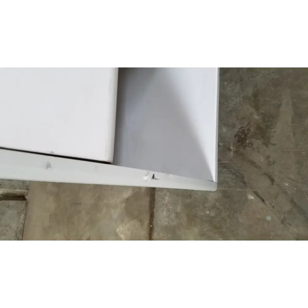 White cabinet with smooth reflective surface and visible corner joint in advanced sterilization products sterrad nx sterilizer