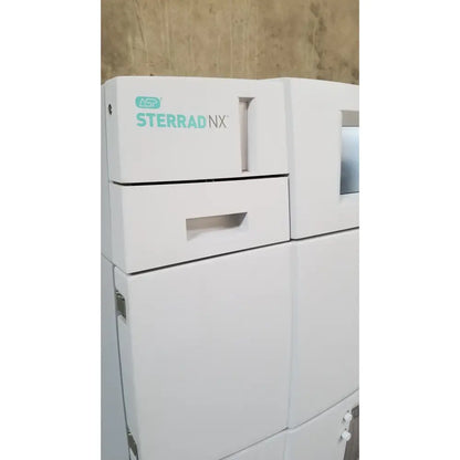 White asp sterrad nx sterilizer with sleek modular design and teal branding from advanced sterilization products