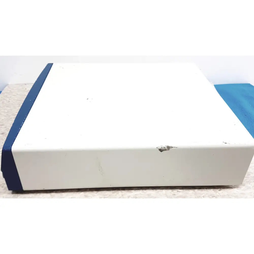 White and blue plastic binder with worn surface for aesculap 78532 lektrofuse electrosurgical generator unit