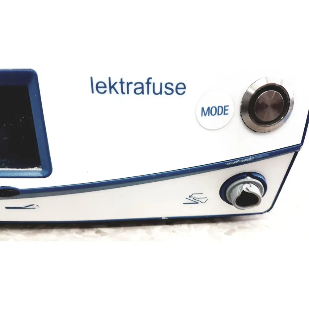 White and blue aesculap 78532 lektrofuse electrosurgical generator unit with circular mode button and metallic knob