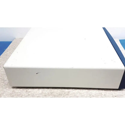 White rectangular lektrofuse electrosurgical generator unit with blue edge for precision surgical use by Aesculap 78532