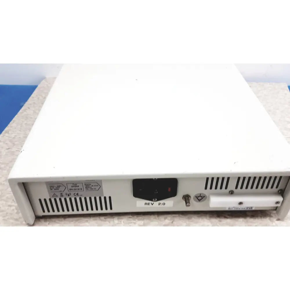 White rectangular lektrofuse electrosurgical generator unit showing ventilation slits and power switch on the back panel