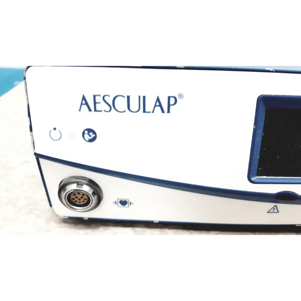 White and blue aesculap 78532 lektrofuse electrosurgical generator unit with circular port screen and control icons