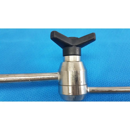 Stainless steel aesculap ff168r surgical retractor with black cross-shaped handle for precise surgical use