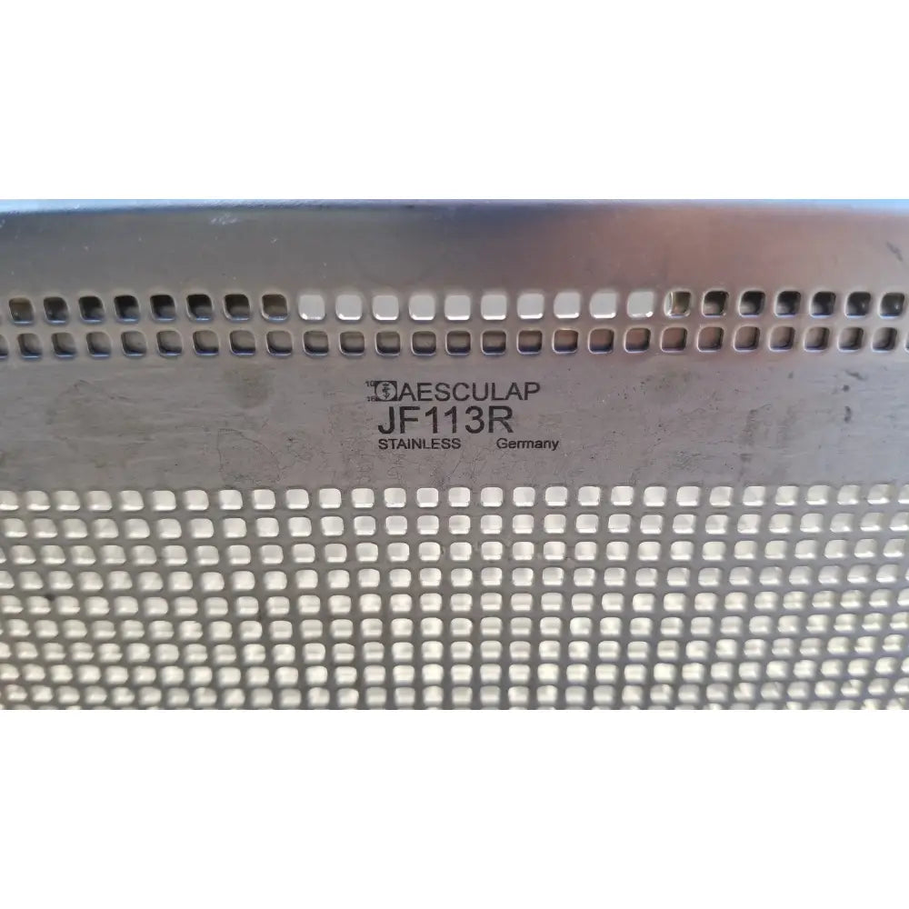 Stainless steel perforated panel with square holes and engraved branding of aesculap jf113r stainless instrument sterilization tray