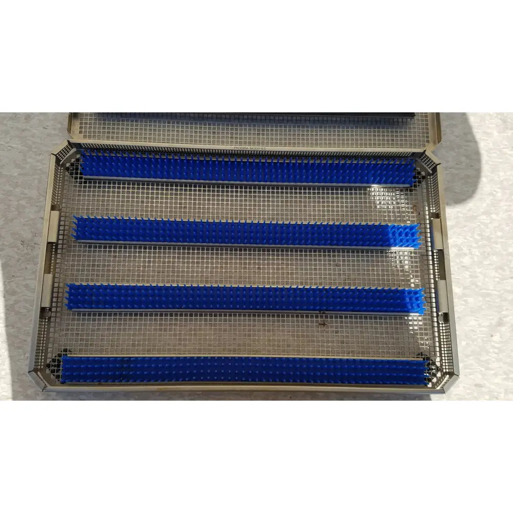 A sleek stainless steel jf257r jf251r knife blade with perforated edge and dewalt branding for aseptic use