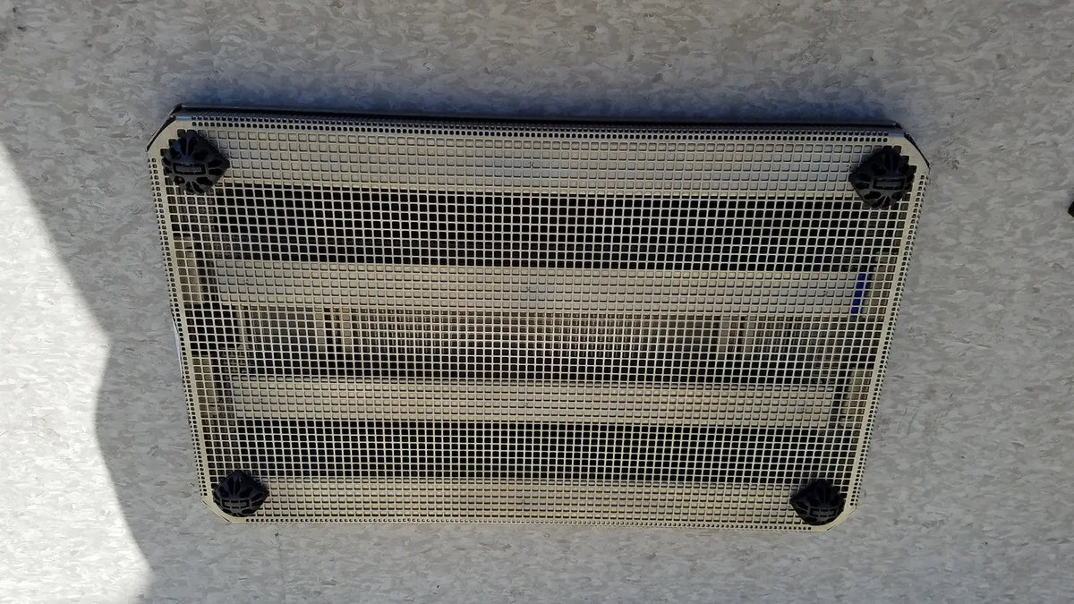 Rectangular metal mesh vent with black plastic corner caps for aesculap jf257r sterilization case tray pn2089a modified