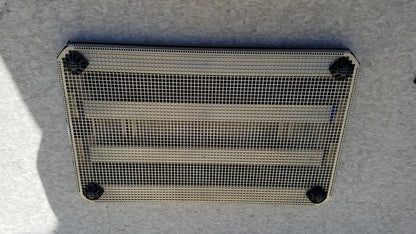 Rectangular metal mesh vent with black plastic corner caps for aesculap jf257r sterilization case tray pn2089a modified