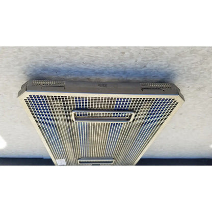 Silver metallic mesh air vent with rectangular handle and perforated grille on aesculap jf257r sterilization case tray