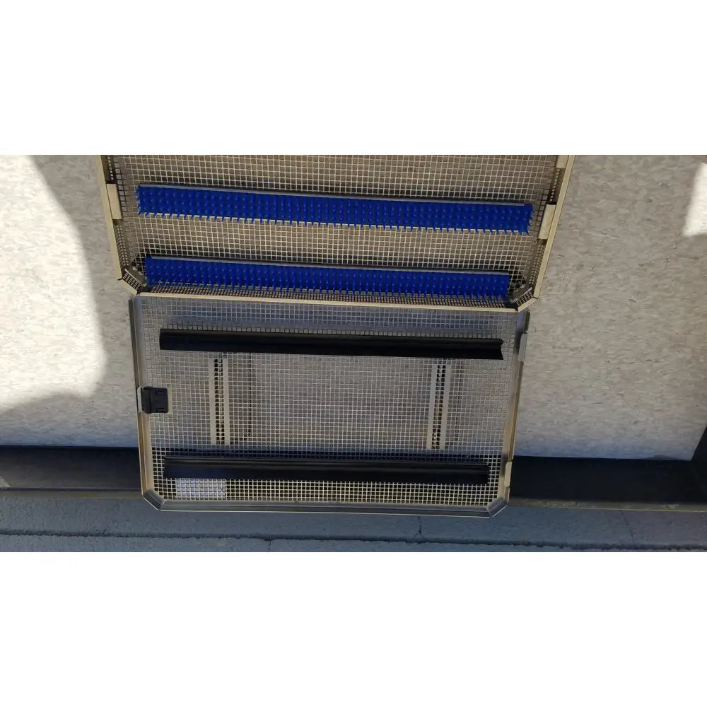 Metal mesh storage rack with blue and black bars in aesculap jf257r sterilization case tray pn2089a modified model