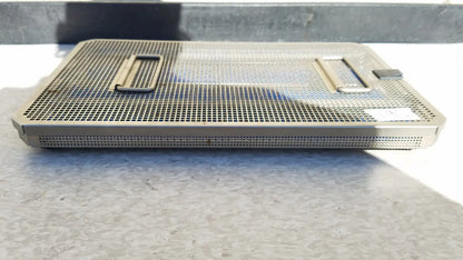 Rectangular stainless steel aesculap jf257r sterilization case tray with perforated mesh surface and two handles