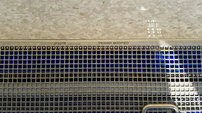 Stainless steel ventilation grille with engraved model markings on the back of aesculap jf257r sterilization case tray