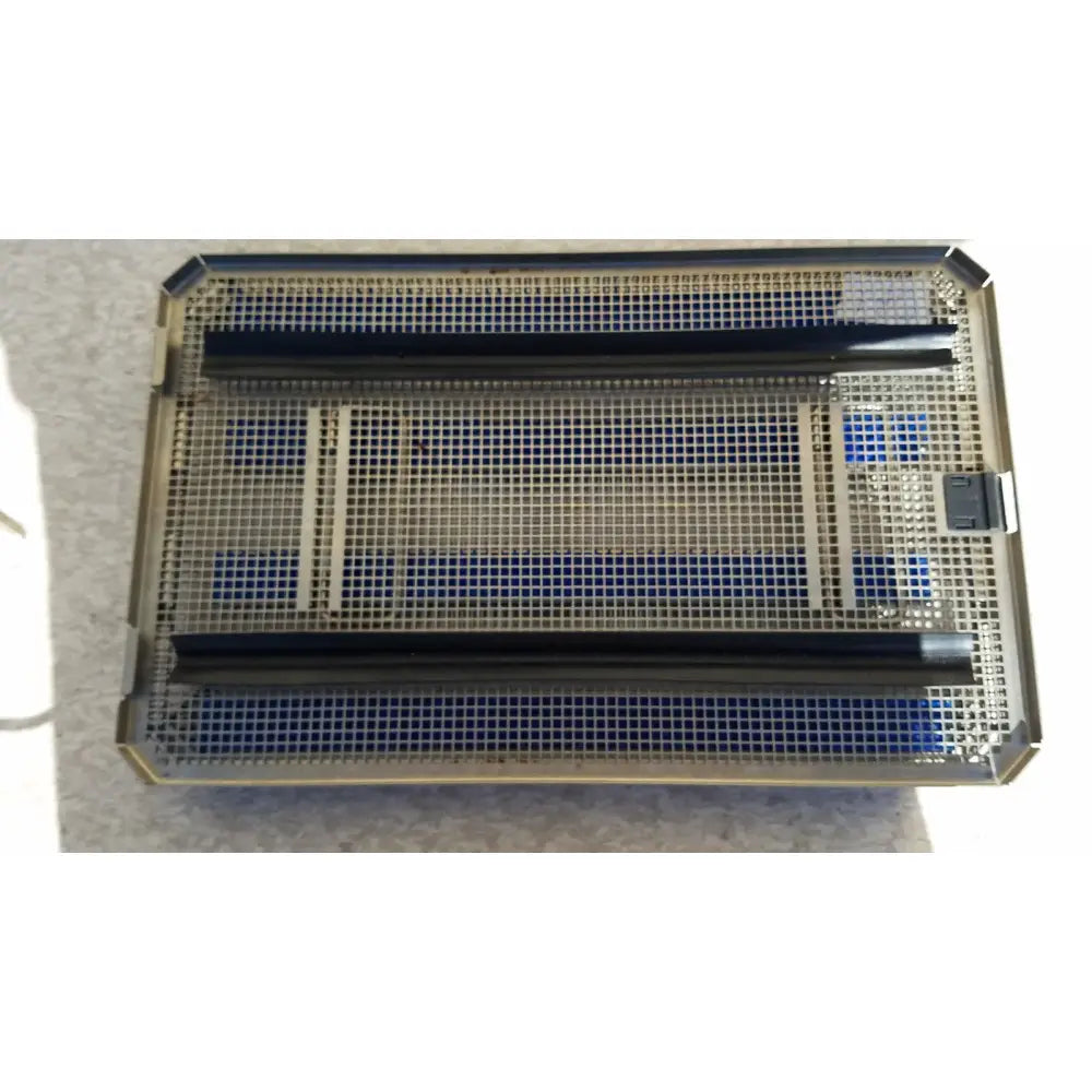 Rectangular metal aesculap jf257r sterilization case tray with black plastic dividers and blue foam inserts for surgical use