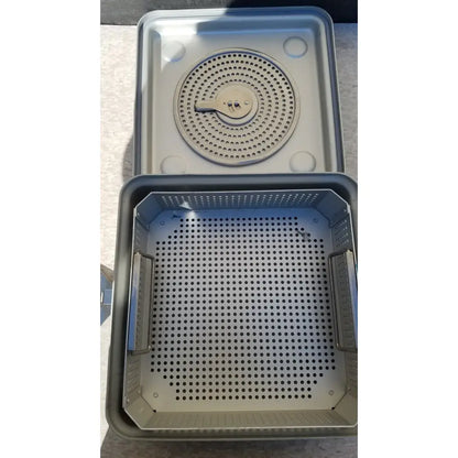 Gray metal aesculap jk341 half size sterilization case with perforated tray and circular component for surgical use