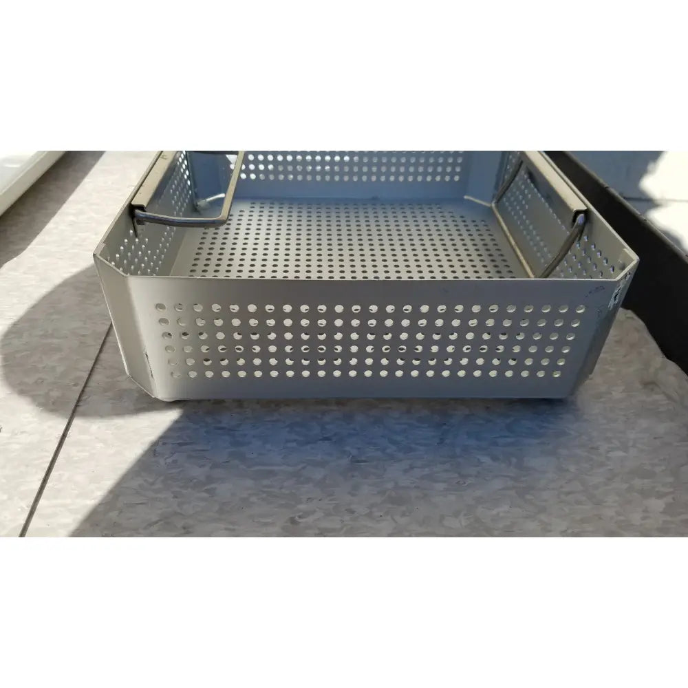 Silver perforated metal aesculap jk341 half size sterilization pan with reinforced handles for medical use