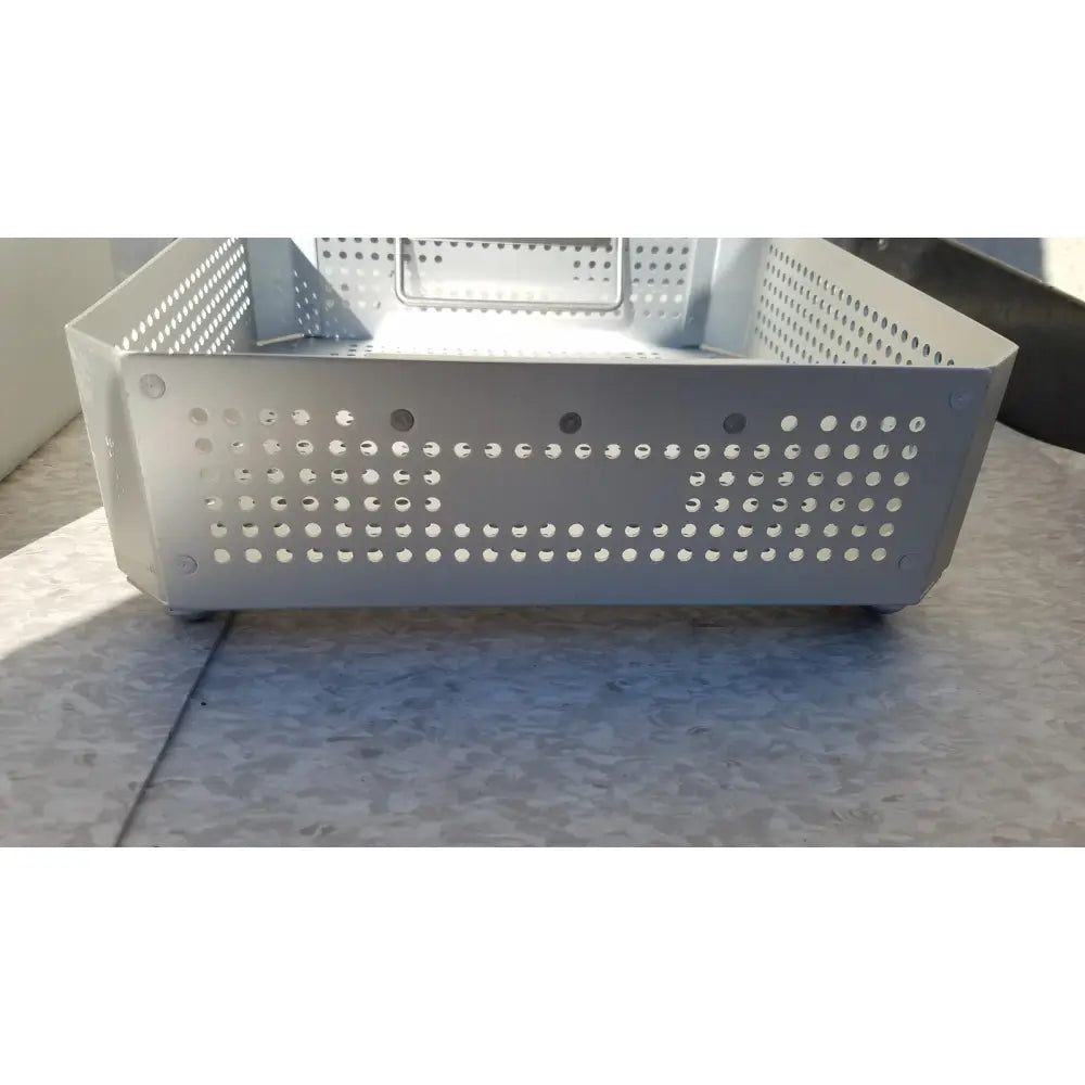 Silver perforated metal storage bin in a rectangular shape for aesculap jk341 half size sterilization case with lid