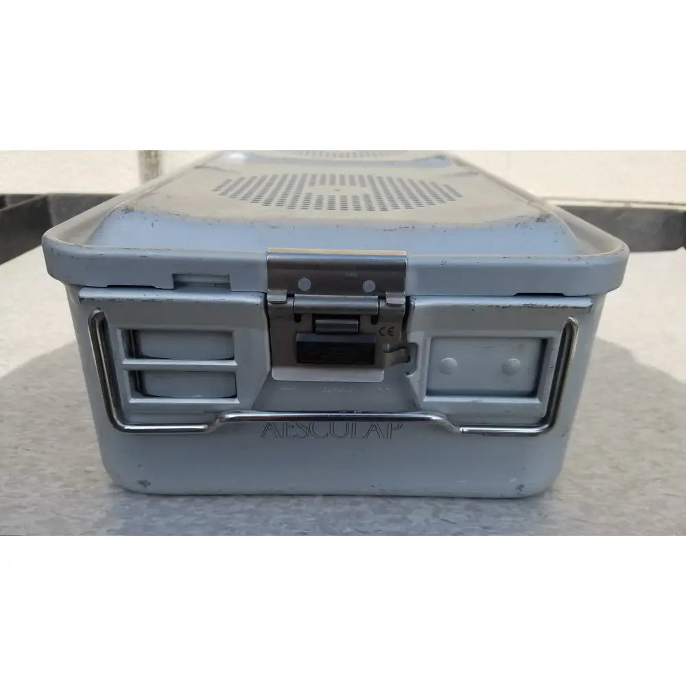 Light gray plastic aesculap jk489 jk442 sterilization container case with metal latch and handle for medical use