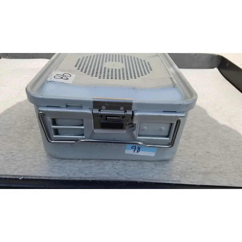 Gray metal aesculap jk489 jk442 sterilization container case with perforated lid and sturdy latches for medical use