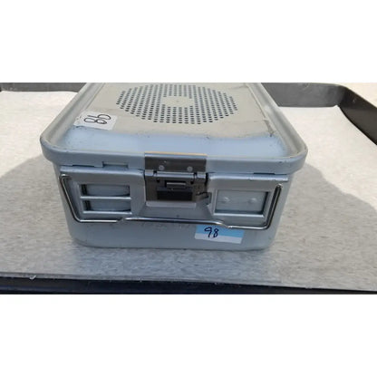 Gray metal aesculap jk489 jk442 sterilization container case with perforated lid and sturdy latches for medical use