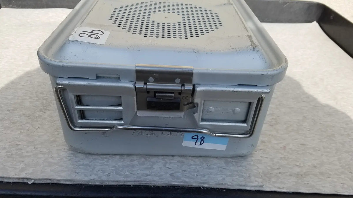 Gray metal aesculap jk489 jk442 sterilization container case with perforated lid and sturdy latches for medical use