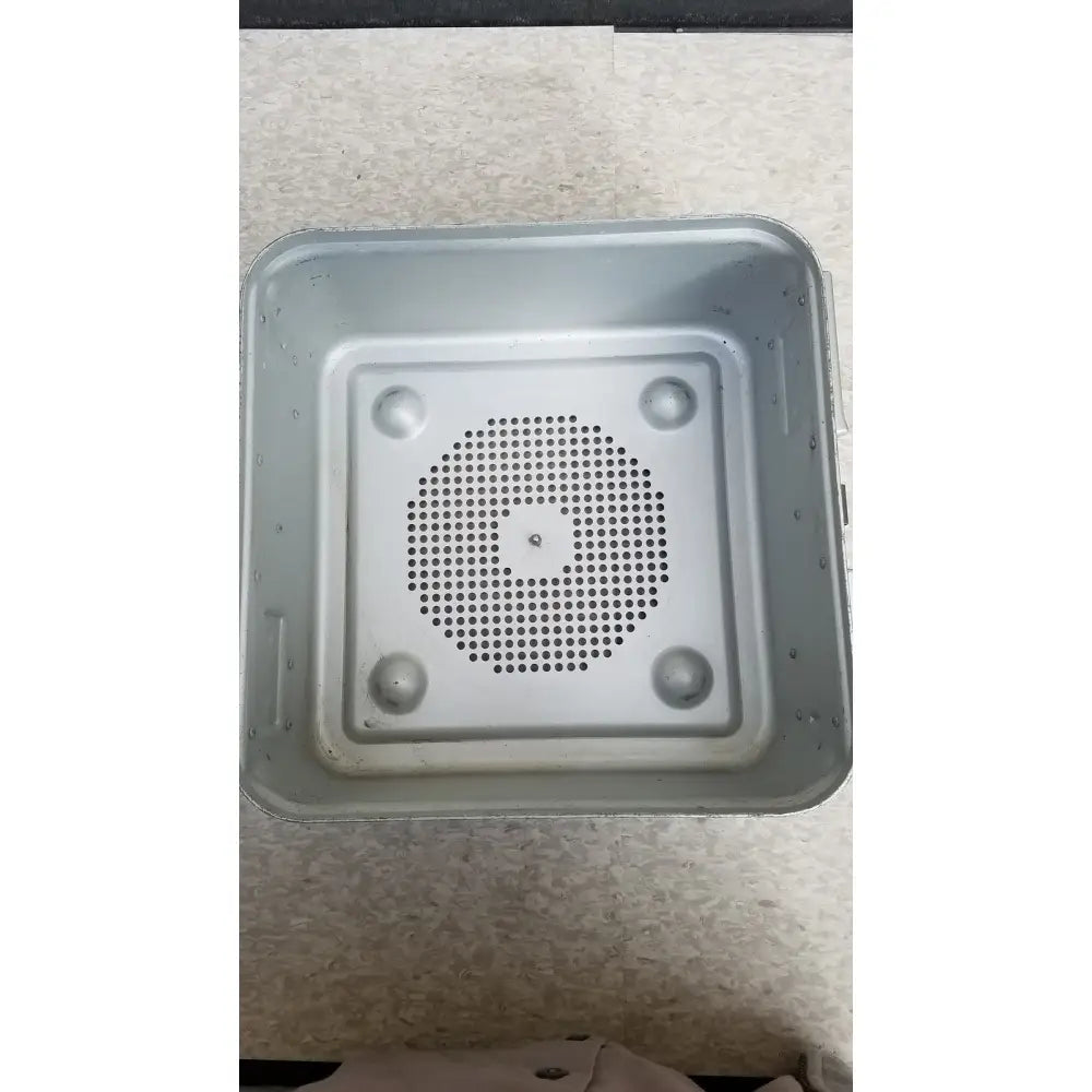 Gray metal aesculap jn341 sterilization container with perforated center and rounded corners for medical use