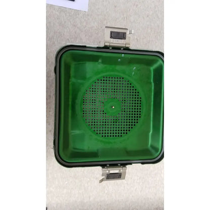 Green plastic aesculap jn341 sterilization container with black rim and two metallic side latches for secure closure