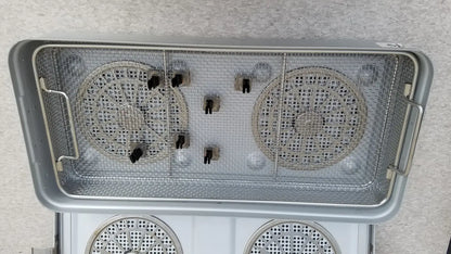 Silver stainless steel aesculap jn821 sterilization case instrument tray and basket with mesh interior and perforated trays