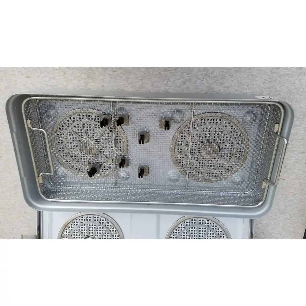 Silver stainless steel aesculap jn821 sterilization case instrument tray and basket with mesh interior and perforated trays