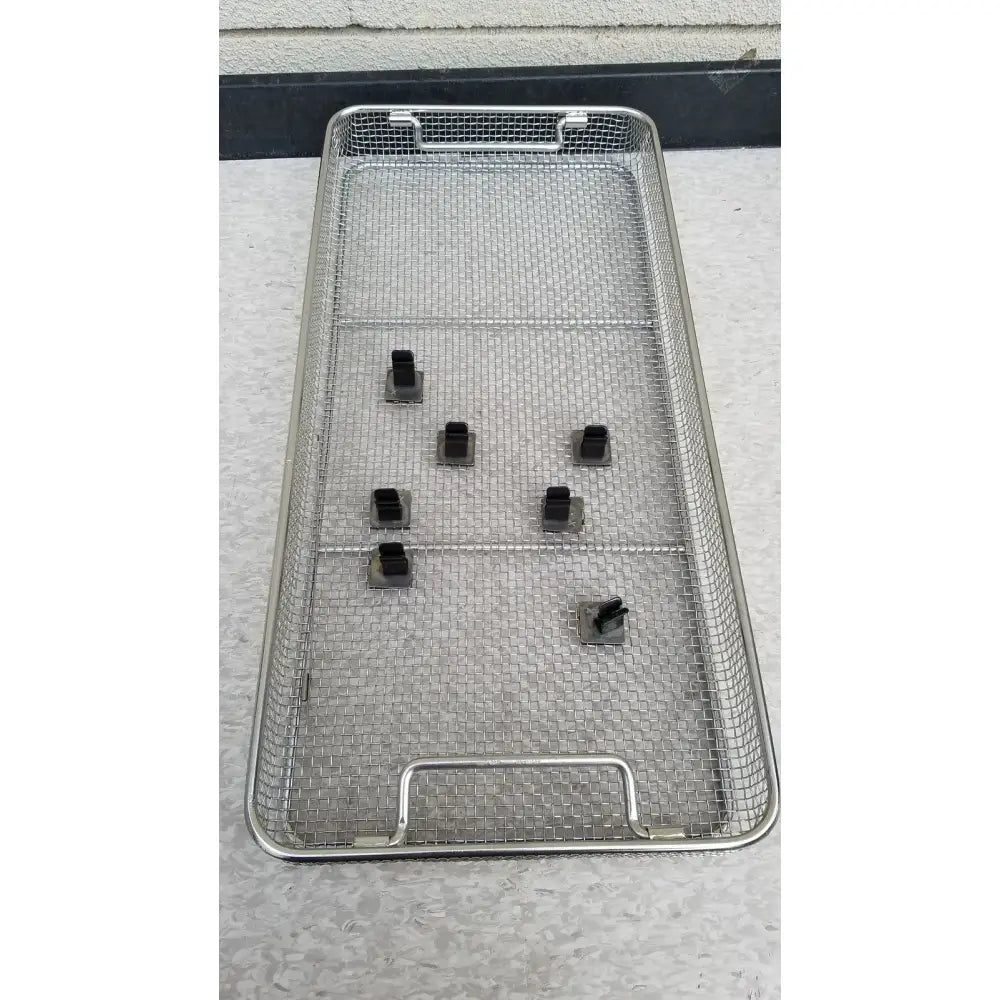 Aesculap JN821 sterilization case stainless steel mesh tray with black plastic clips for instrument storage