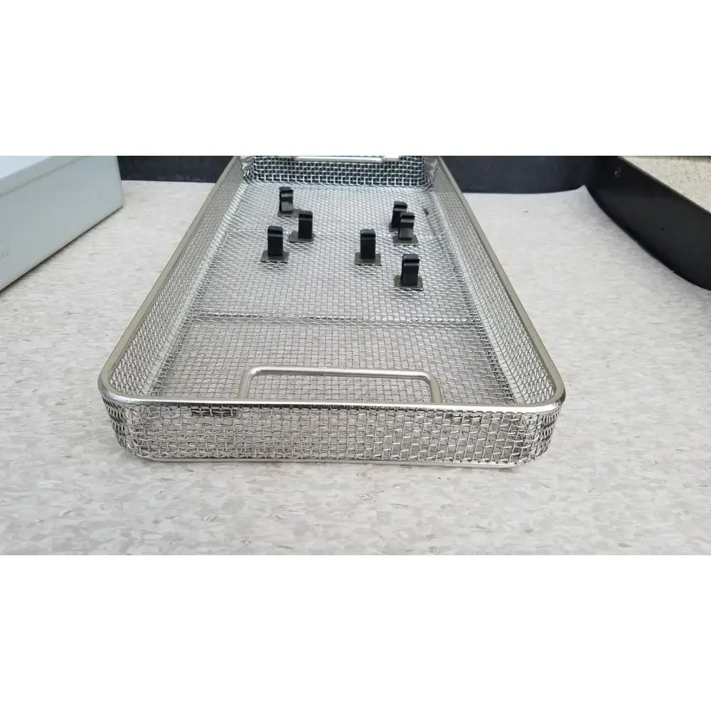 Stainless steel mesh surgical instrument tray with black plastic handles for aesculap jn821 sterilization case instrument use