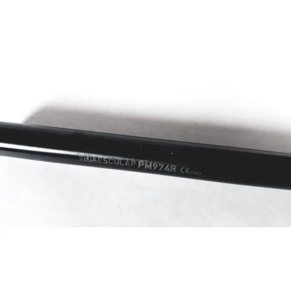 Black cylindrical aesculap laparoscopic 10mm 30cm outer shaft with engraved text and matte finish for surgical use