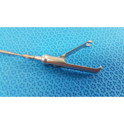Stainless steel aesculap laparoscopic grasper model p0623r with polished dual-pronged design and branded handle