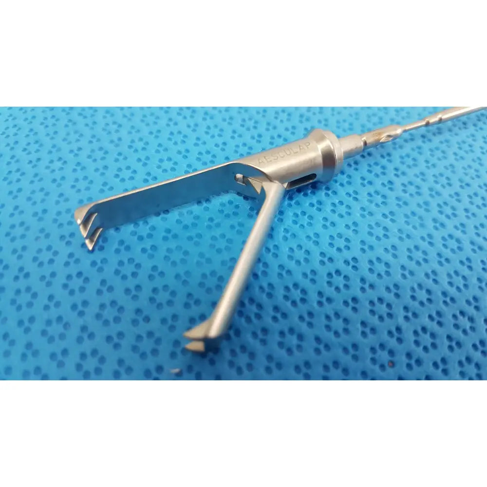 Aesculap laparoscopic grasper model p0623r metallic instrument with silver textured handle and opposing prongs for tissue gripping