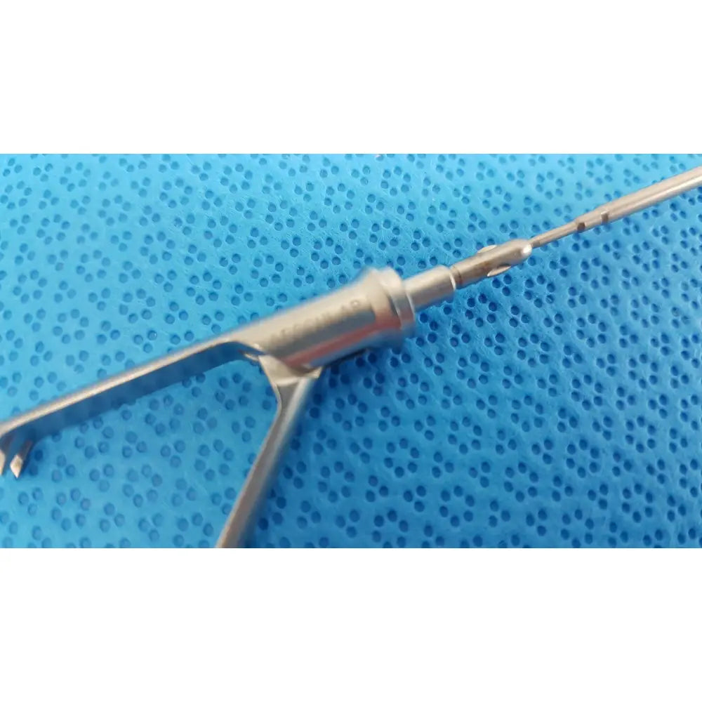 Stainless steel aesculap laparoscopic grasper model p0623r with slender polished shaft and articulated fine-tipped blades