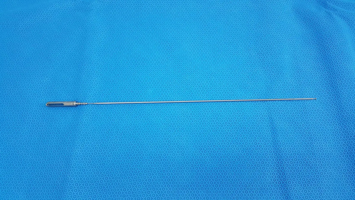 Silver surgical retractor with slender metallic shaft and textured handle in aesculap laparoscopic grasper model p0623r
