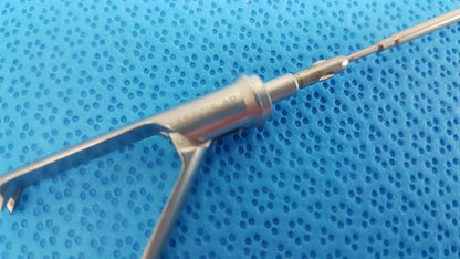 Stainless steel aesculap laparoscopic grasper model p0623r with slender polished shaft and articulated fine-tipped blades