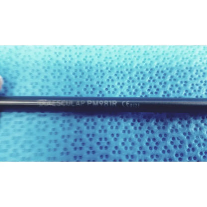 Black cylindrical aesculap laparoscopic grasper ref pm981r medical device with engraved text and ce marking